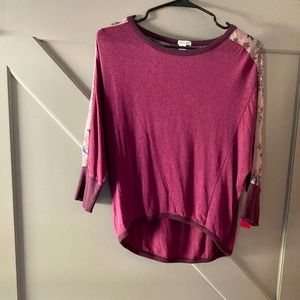 Plum knit top with relaxed fit